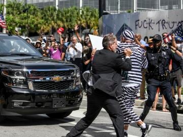 The man arrested for crossing Trump’s path with the “Lock him up” sign: “It was worth it”
