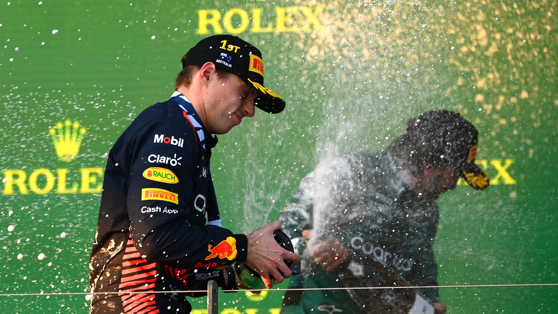 Verstappen y Alonso en el podio