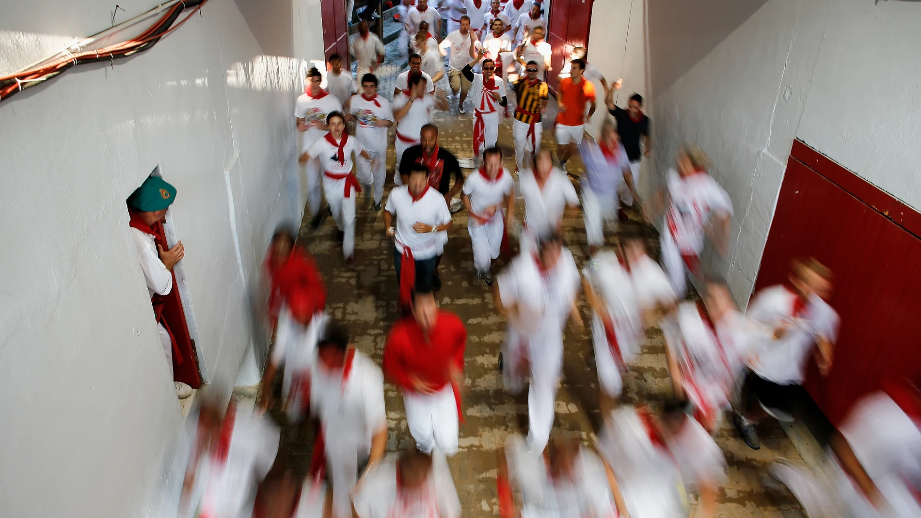 Una imagen de corredores terminando un encierro de San Fermín (Pamplona) en 2013