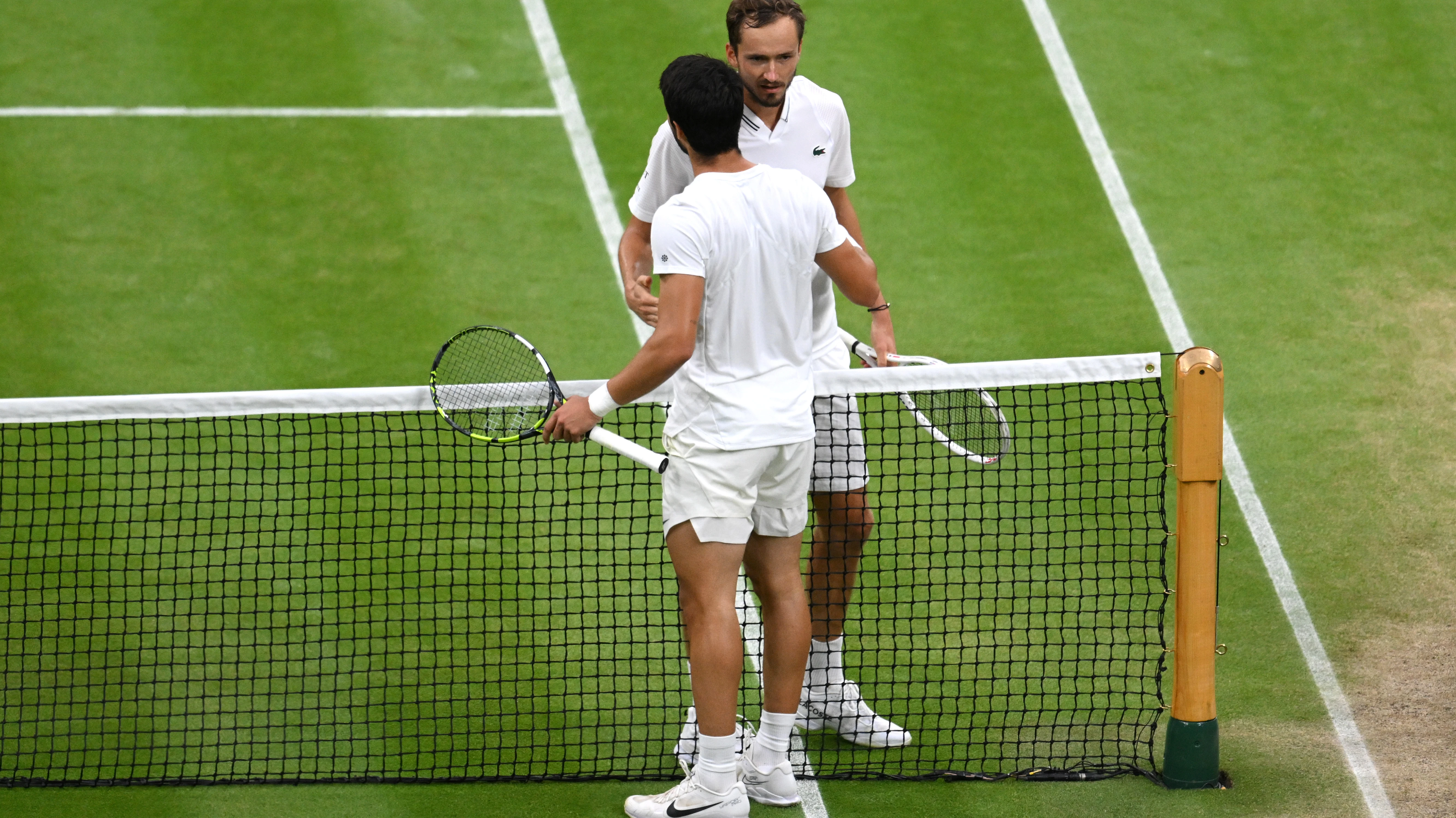 Carlos Alcaraz y Daniil Medvedev