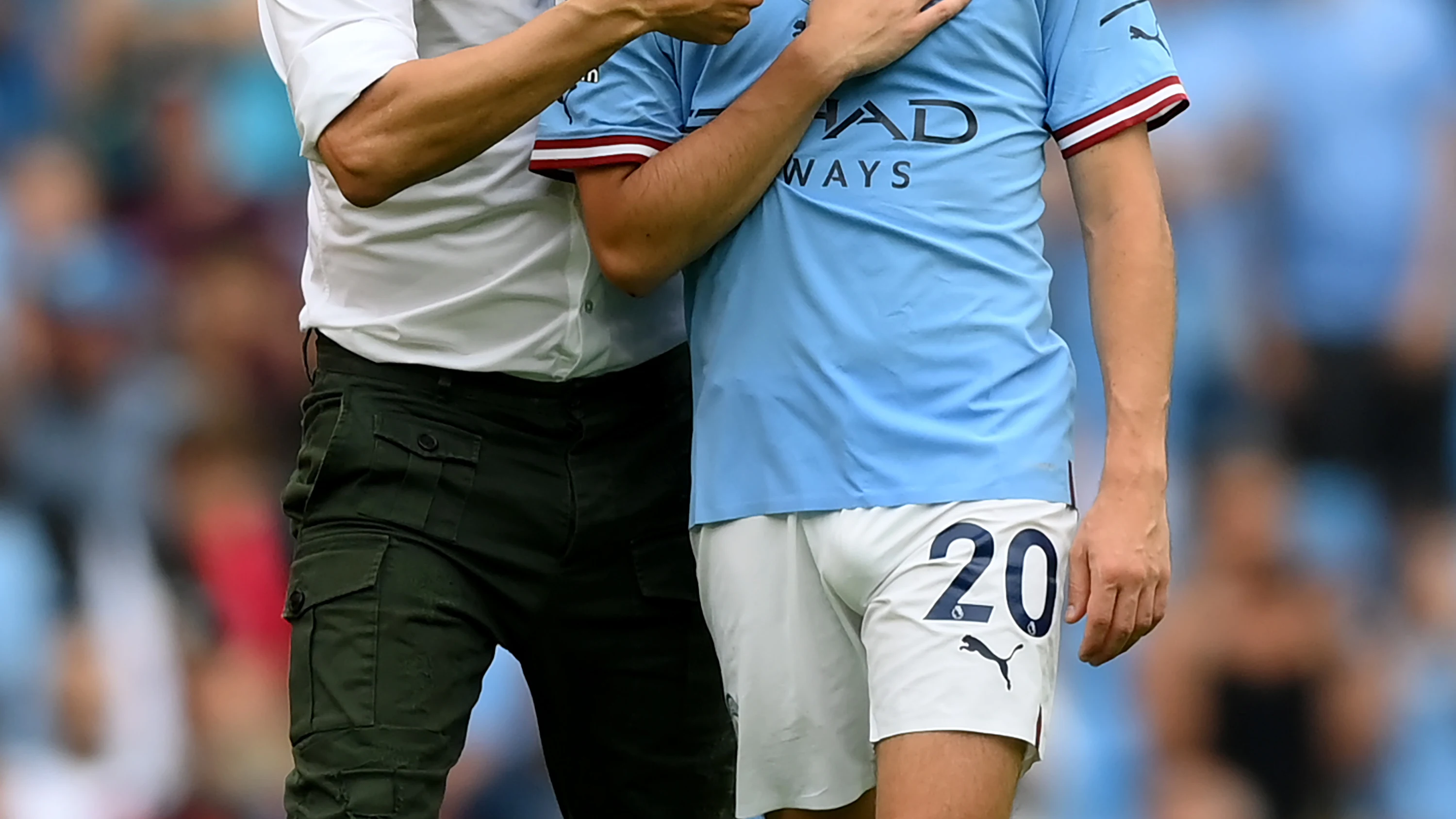 Pep Guardiola y Bernardo Silva