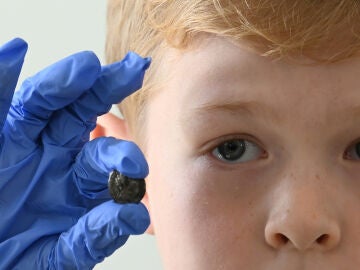 A boy finds an 1,800-year-old Roman coin in Bremen, Germany while playing