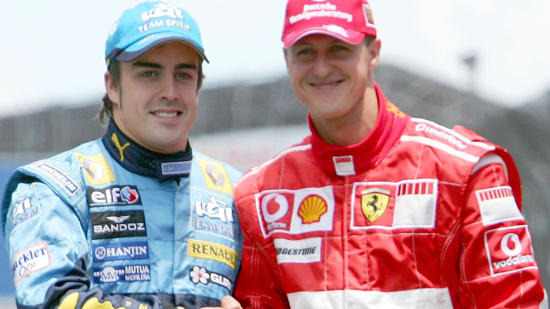 Fernando Alonso, con Michael Schumacher