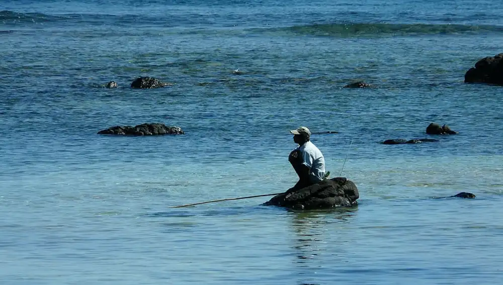 Pescador en Isla Mauricio
