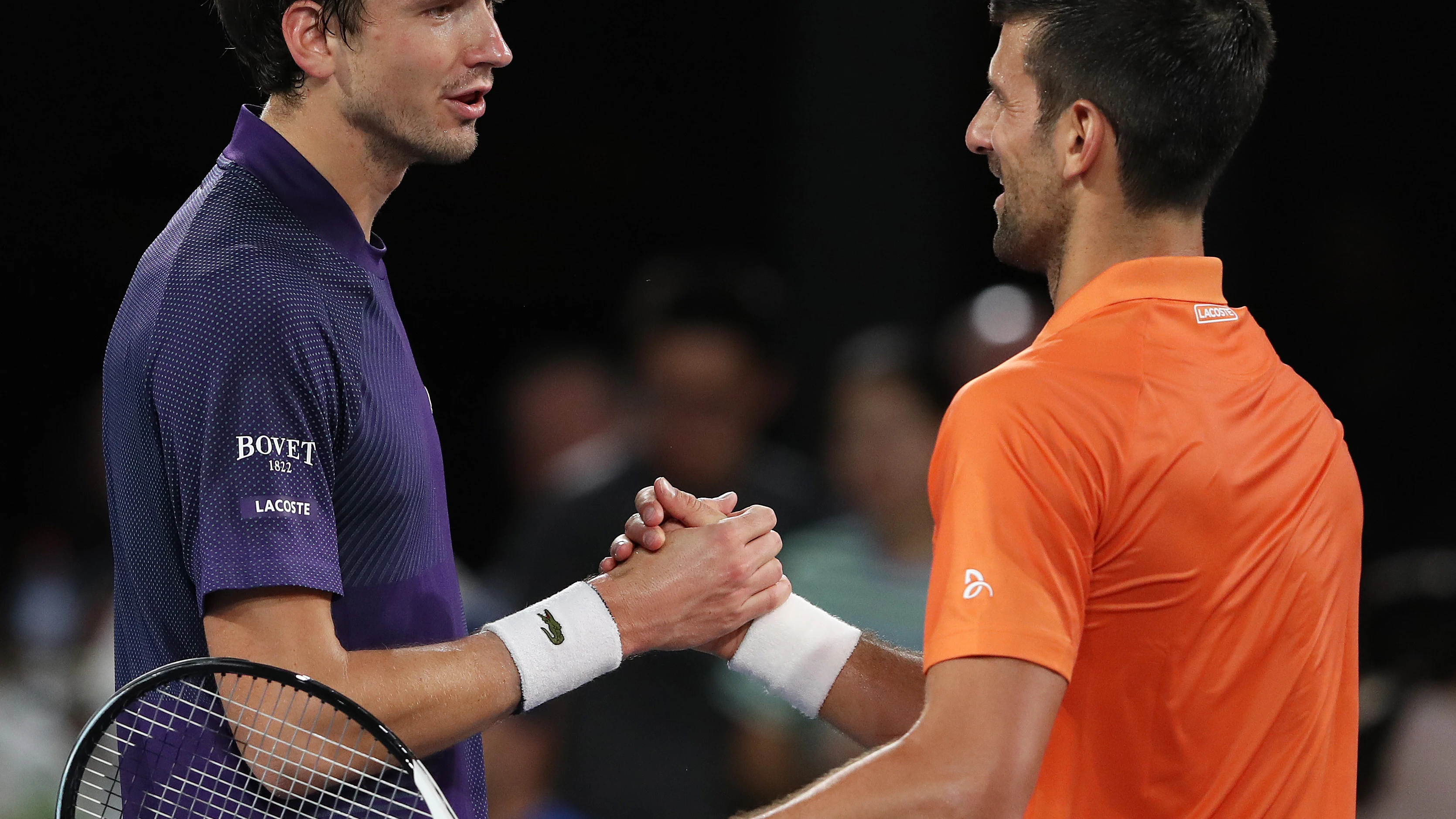 Daniil Medvedev y Novak Djokovic