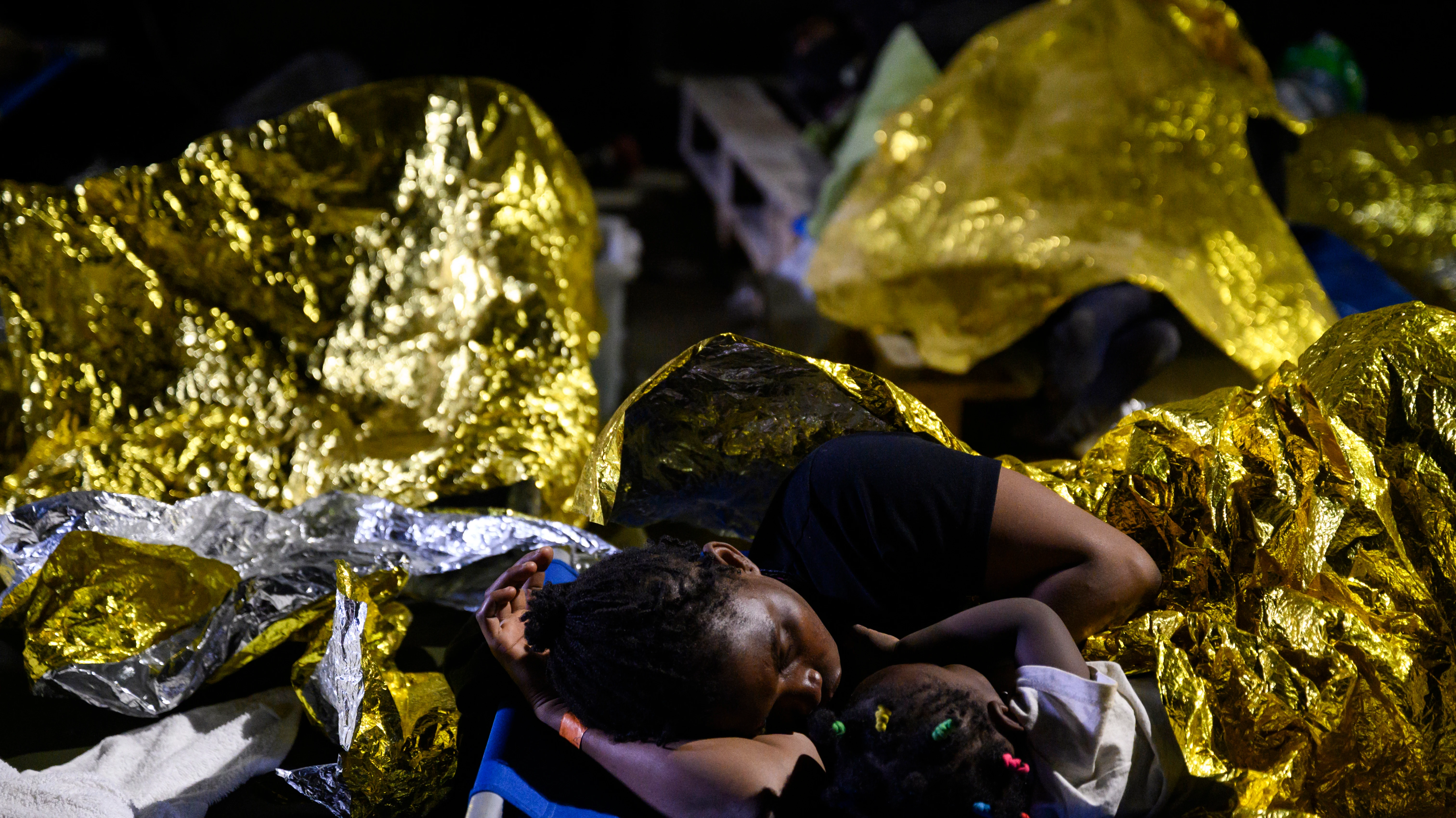 Migrantes llegados a Lampedusa