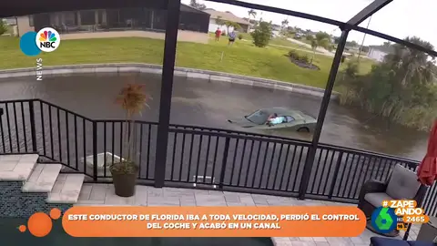 Un conductor pierde el control de su coche durante una carrera por un vecindario de Florida y acaba en el agua