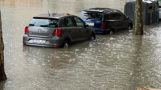 Lluvia acumulada en la calle Antonio López de Madrid Lluvia acumulada en la calle Antonio López de Madrid
