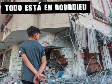 Niño palestino ante un edificio destruido