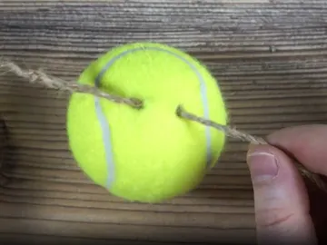 Truco de la pelota de tenis Truco de la pelota de tenis