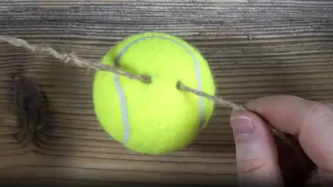 Truco de la pelota de tenis Truco de la pelota de tenis