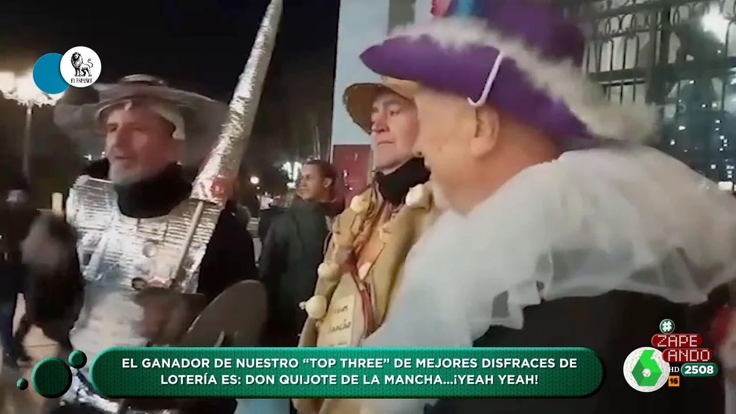 Del obispo "del Palmar" al Quijote 'rapero': Zapeando analiza los mejores disfraces de la Lotería de Navidad Los disfraces en el sorteo de la Lotería de Navidad ya son toda una tradición y, este año, María Gómez ha querido hacer su particular top 3 con los mejores. Su análisis, y los divertidos comentarios de los colaboradores de Zapeando, en este vídeo.
