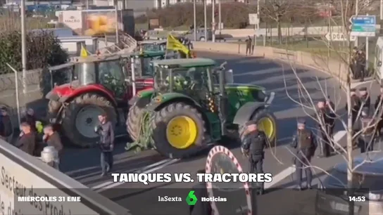 Los 'chalecos verdes' siguen con su asedio a París e ignoran las líneas rojas del Gobierno francés Los 'chalecos verdes' siguen con su asedio a París e ignoran las líneas rojas del Gobierno francés