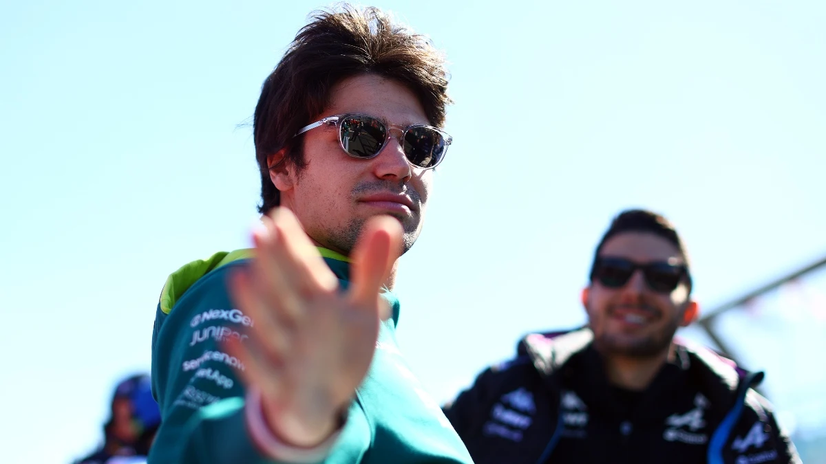 Lance Stroll, con Esteban Ocon tras él