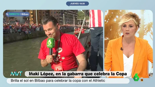 La reacción de Cristina Pardo al ver a Iñaki López junto a la gabarra del Athletic Iñaki López acompaña el periplo de la gabarra del Athletic Club y, desde el barco de la prensa, interactúa con algunos de los miles de aficionados que ocupan ambos lados de la ría, a los que en este vídeo pide un saludo para Cristina Pardo.