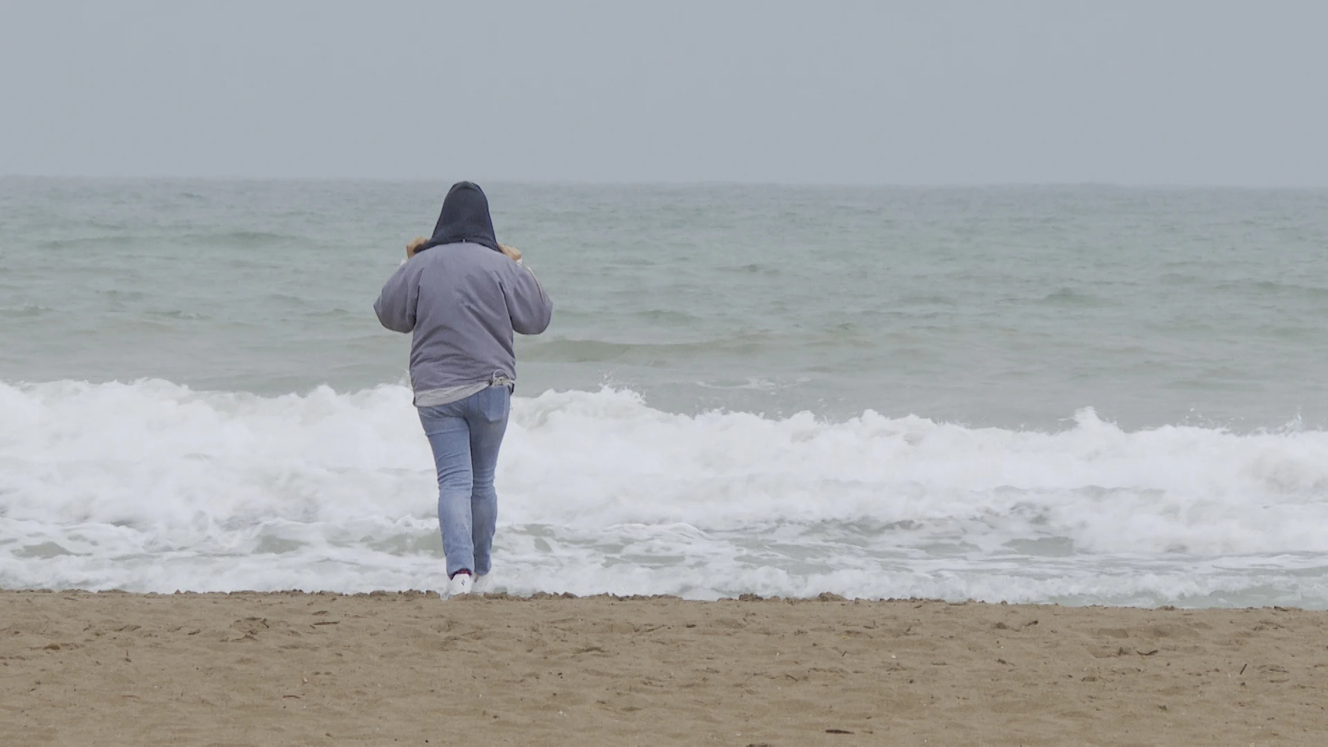 Imagen de archivo de una persona en la playa.