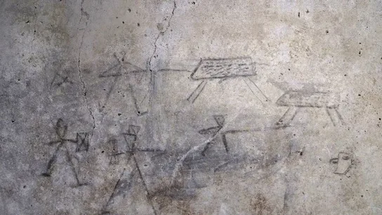 Dibujos en las paredes de Pompeya hechos por niños Dibujos en las paredes de Pompeya hechos por niños