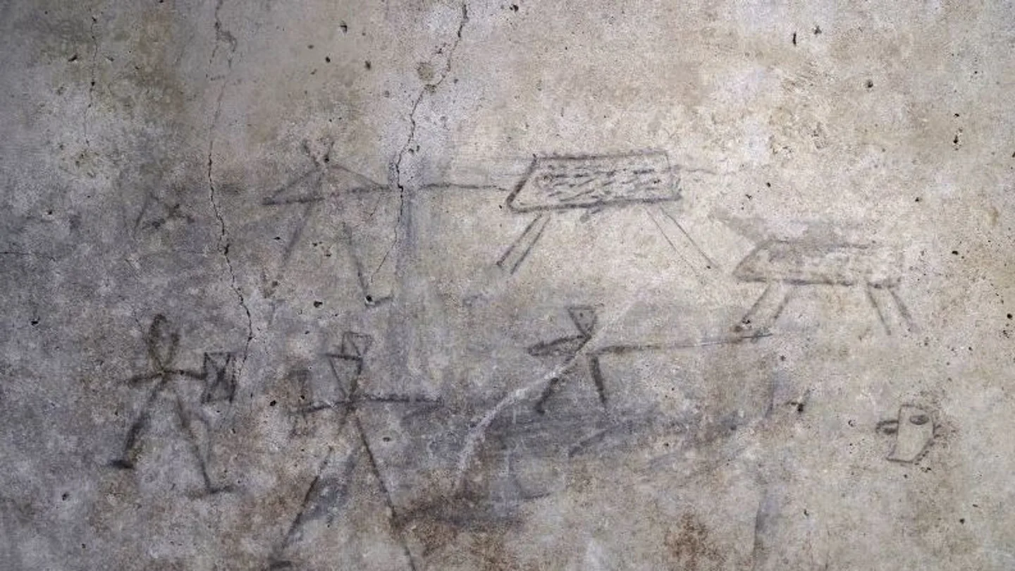 Dibujos en las paredes de Pompeya hechos por niños Dibujos en las paredes de Pompeya hechos por niños