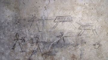 Dibujos en las paredes de Pompeya hechos por niños