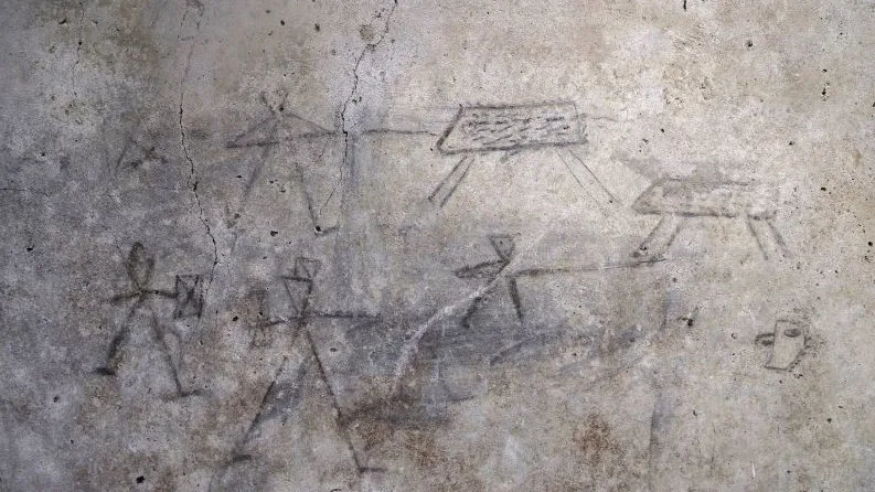 Dibujos en las paredes de Pompeya hechos por niños