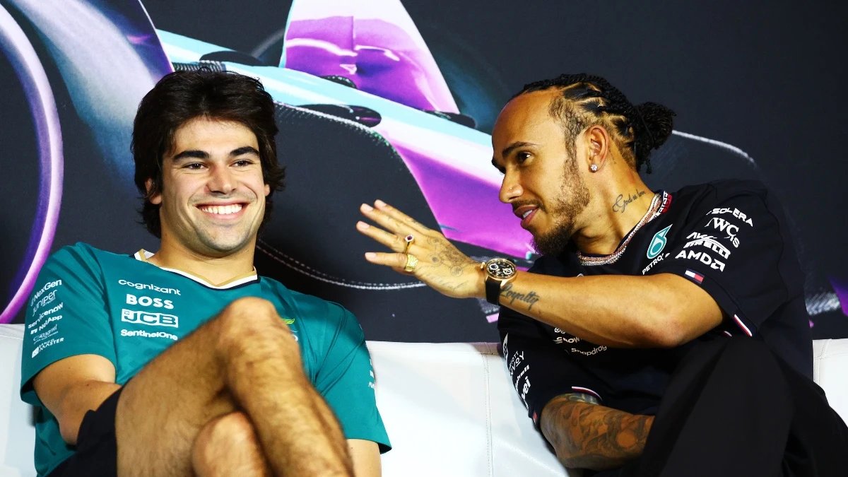 Hamilton charla con Lance Stroll