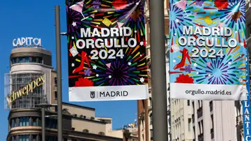 Carteles del Orgullo 2024 del Ayuntamiento de Madrid, en la calle Gran Vía, de Madrid