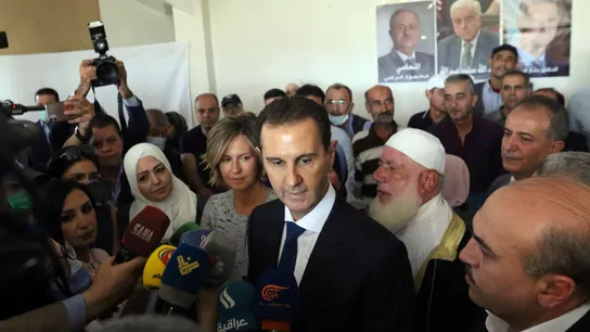Al-Assad, en una foto de archivo Al-Assad, en una foto de archivo