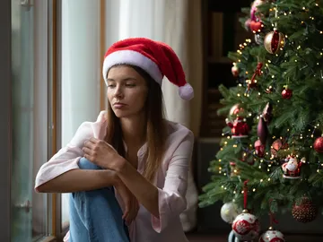 Persona triste en Navidad Persona triste en Navidad
