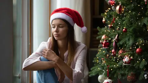 Persona triste en Navidad Persona triste en Navidad