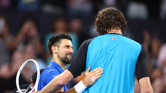 Novak Djokovic y Reilly Opelka Novak Djokovic y Reilly Opelka