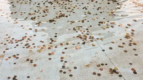 Monedas en una fuente de Roma Monedas en una fuente de Roma