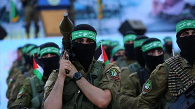 Miembros de la Brigada Ezzeldín al Qassam, brazo armado del Movimiento de Resistencia Islámica (Hamás) Miembros de la Brigada Ezzeldín al Qassam, brazo armado del Movimiento de Resistencia Islámica (Hamás)