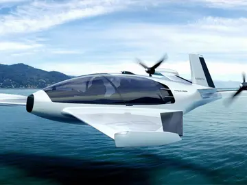 Porsche AG Porsche Design Fusion by Johan Schwind: la aeronave utiliza el efecto suelo para deslizarse de manera segura y eficiente sobre la superficie del agua a velocidades de hasta 250 km/h. La construcción de fibra de carbono de alta calidad ofrece espacio para tres pasajeros. Porsche AG Porsche Design Fusion by Johan Schwind: la aeronave utiliza el efecto suelo para deslizarse de manera segura y eficiente sobre la superficie del agua a velocidades de hasta 250 km/h. La construcción de fibra de carbono de alta calidad ofrece espacio para tres pasajeros.
