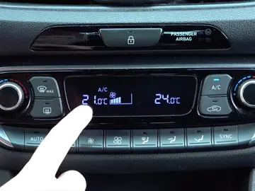 Control de aire acondicionado y calefacción Control de aire acondicionado y calefacción