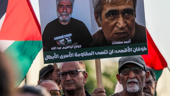 Cartel con imágenes de Georges Abdallah durante un protesta en Túnez en la que pedían su liberación. Cartel con imágenes de Georges Abdallah durante un protesta en Túnez en la que pedían su liberación.