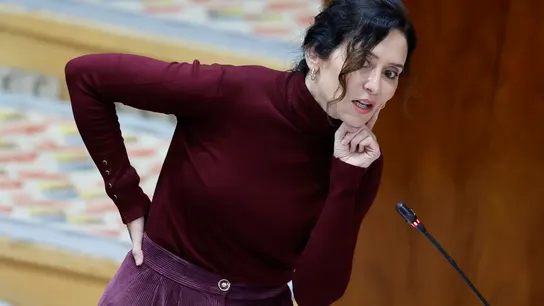 La presidenta regional, Isabel Díaz Ayuso interviene en el pleno de la Asamblea de Madrid, este jueves. La presidenta regional, Isabel Díaz Ayuso interviene en el pleno de la Asamblea de Madrid, este jueves.