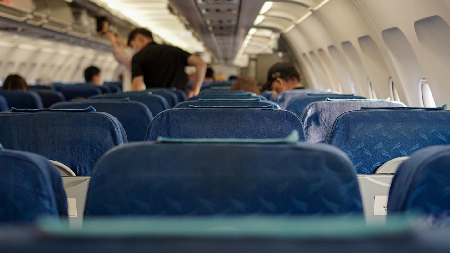 Pasajeros en un avión Pasajeros en un avión