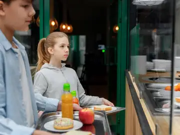 Niños en el comedor Niños en el comedor
