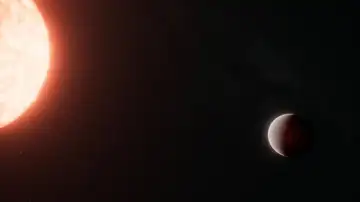 Recreación artística de la supertierra TOI-561 b y su estrella Recreación artística de la supertierra TOI-561 b y su estrella