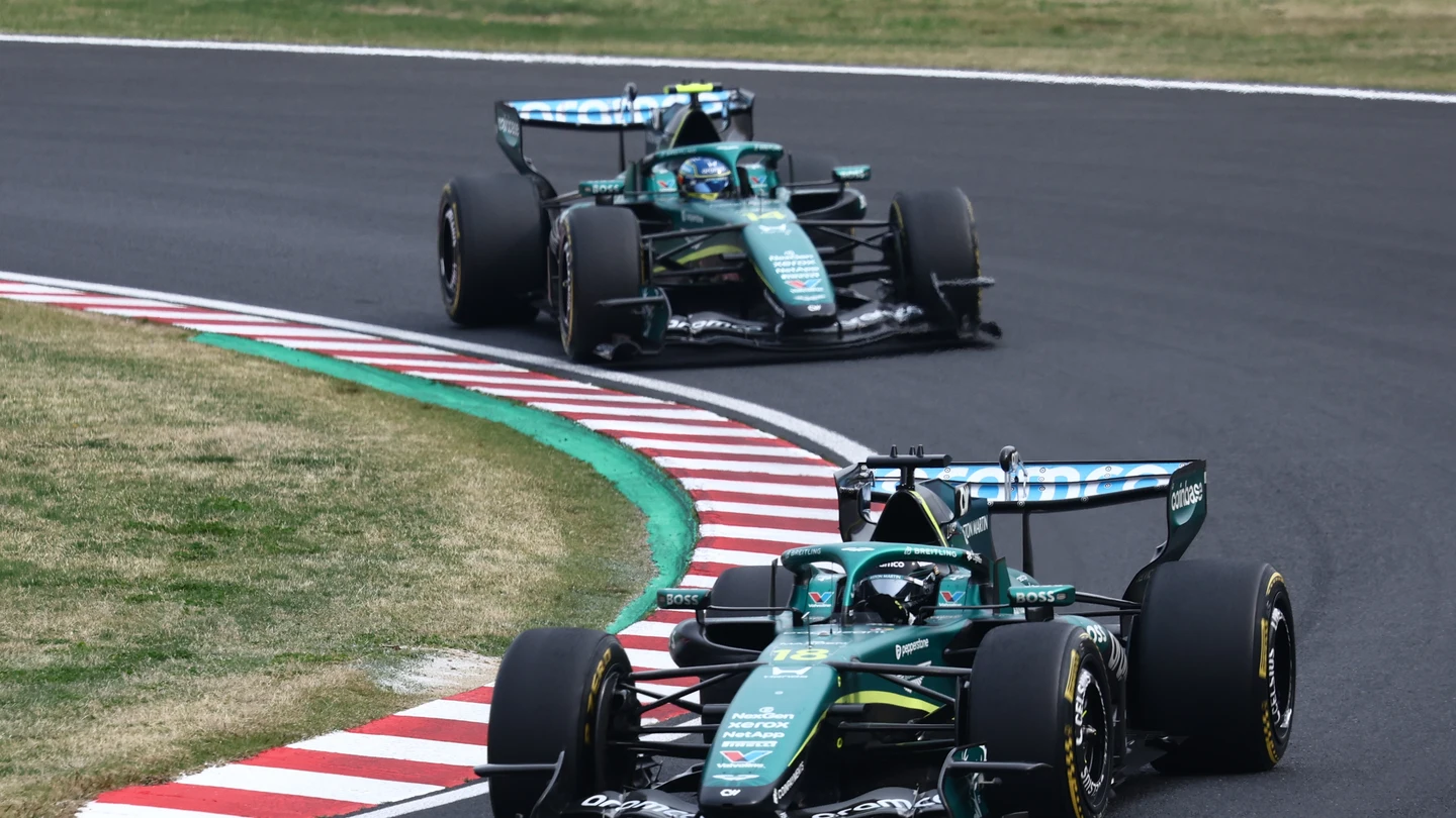 Lance Stroll y Fernando Alonso Lance Stroll y Fernando Alonso