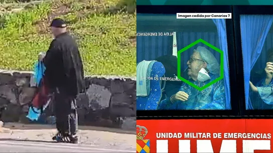 El médico con el EPI en la mano y un señor con la mascarilla bajada El médico con el EPI en la mano y un señor con la mascarilla bajada