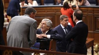 El presidente del Gobierno, Pedro S&aacute;nchez (i), y el ministro del Interior, Fernando Grande-Marlaska