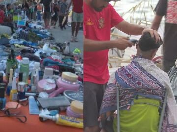 Las playas de Ceuta se convierten en un mercado improvisado: tiendas, cocinas y peluquer&iacute;as entre los asentamientos