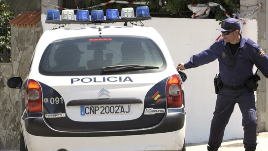 Un coche de la Policía en un suceso. Un coche de la Policía en un suceso.
