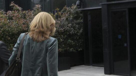 La infanta Cristina, de espaldas antes de entrar al trabajo