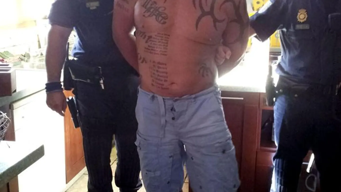 Imagen del momento de detención del fugitivo británico Imagen del momento de detención del fugitivo británico