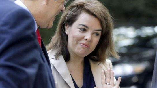 Soraya S&aacute;enz de Santamar&iacute;a y el secretario de la OCDE, &Aacute;ngel Gurr&iacute;a