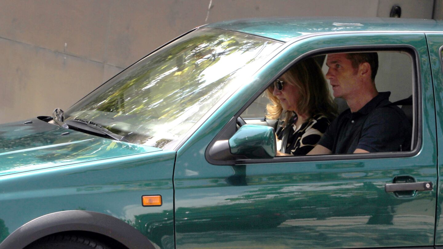 Los Duques de Palma, la infanta Cristina y su esposo I&ntilde;aki Urdangarin, salen de su casa de Pedralbes en Barcelona.