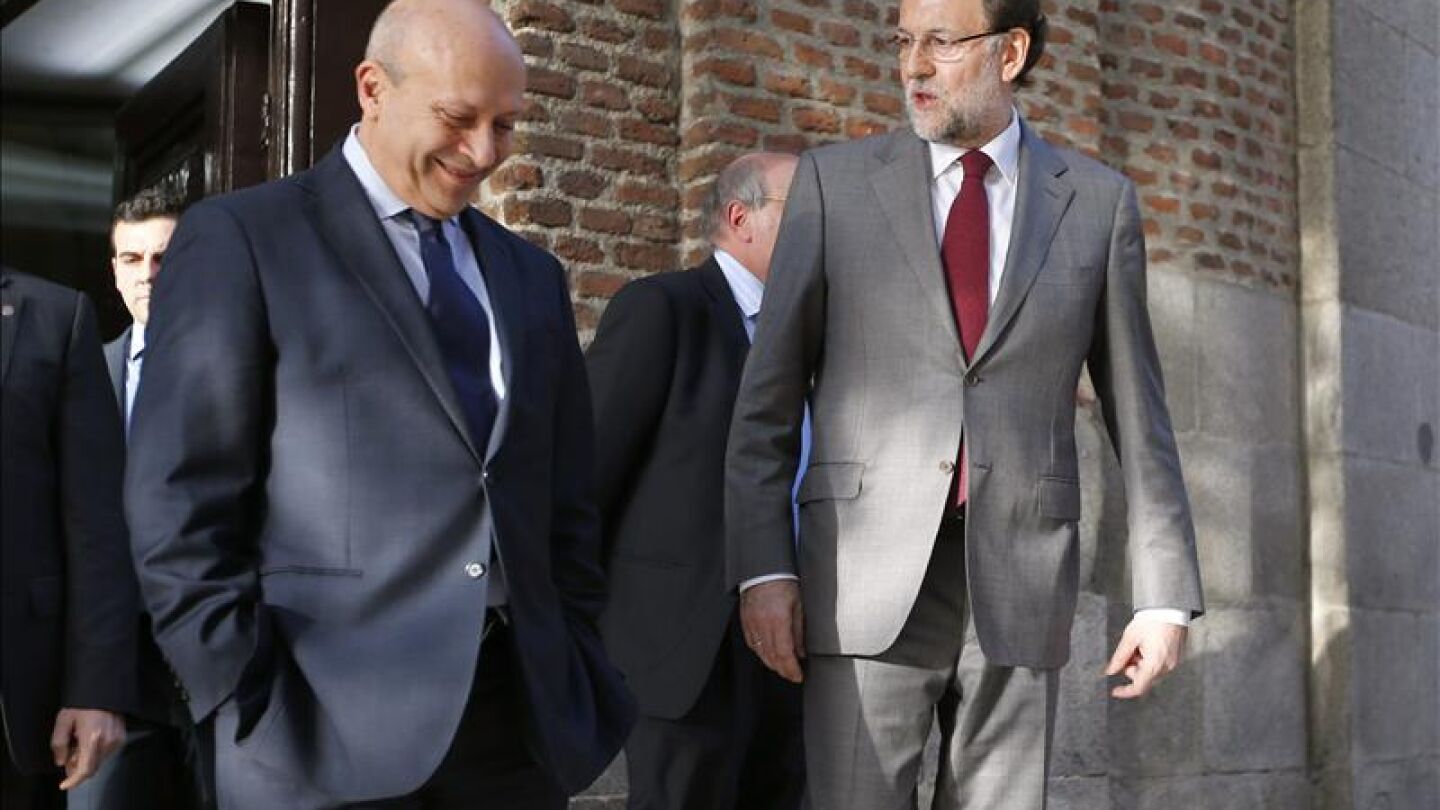 Wert y Rajoy, a la salida de la presentaci&oacute;n