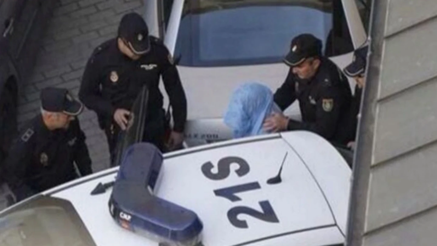 Una de las acusadas del crimen de Carrasco en el traslado a los juzgados Una de las acusadas del crimen de Carrasco en el traslado a los juzgados